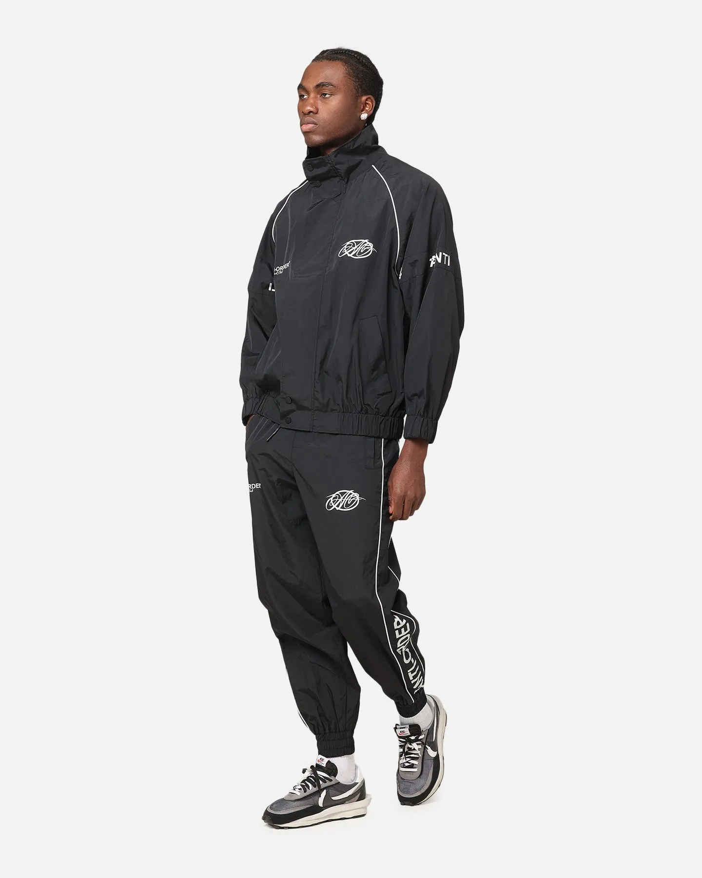 The Anti Order Track Club Windbreaker Jacket Black/Grey