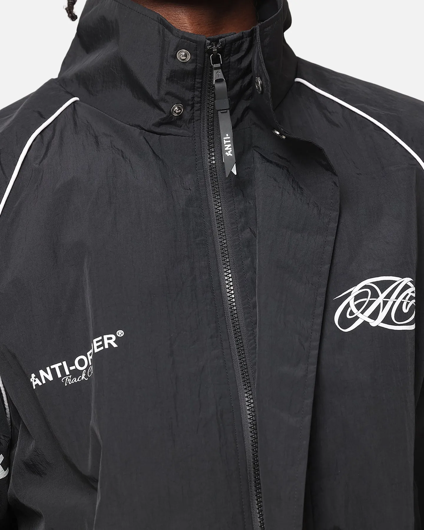 The Anti Order Track Club Windbreaker Jacket Black/Grey